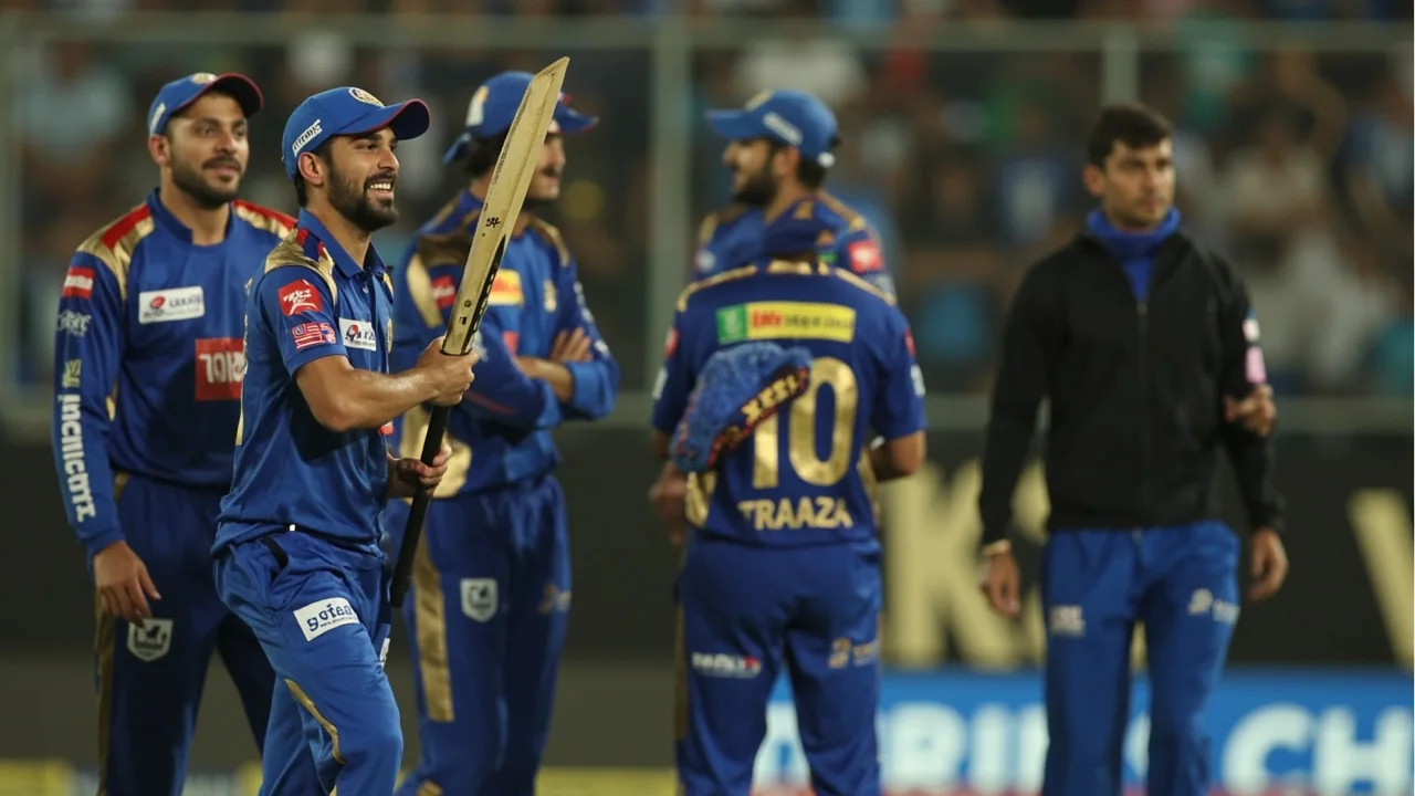 Medium vertical view of a T20 field setting with a spinner running in to bowl at the Wankhede match